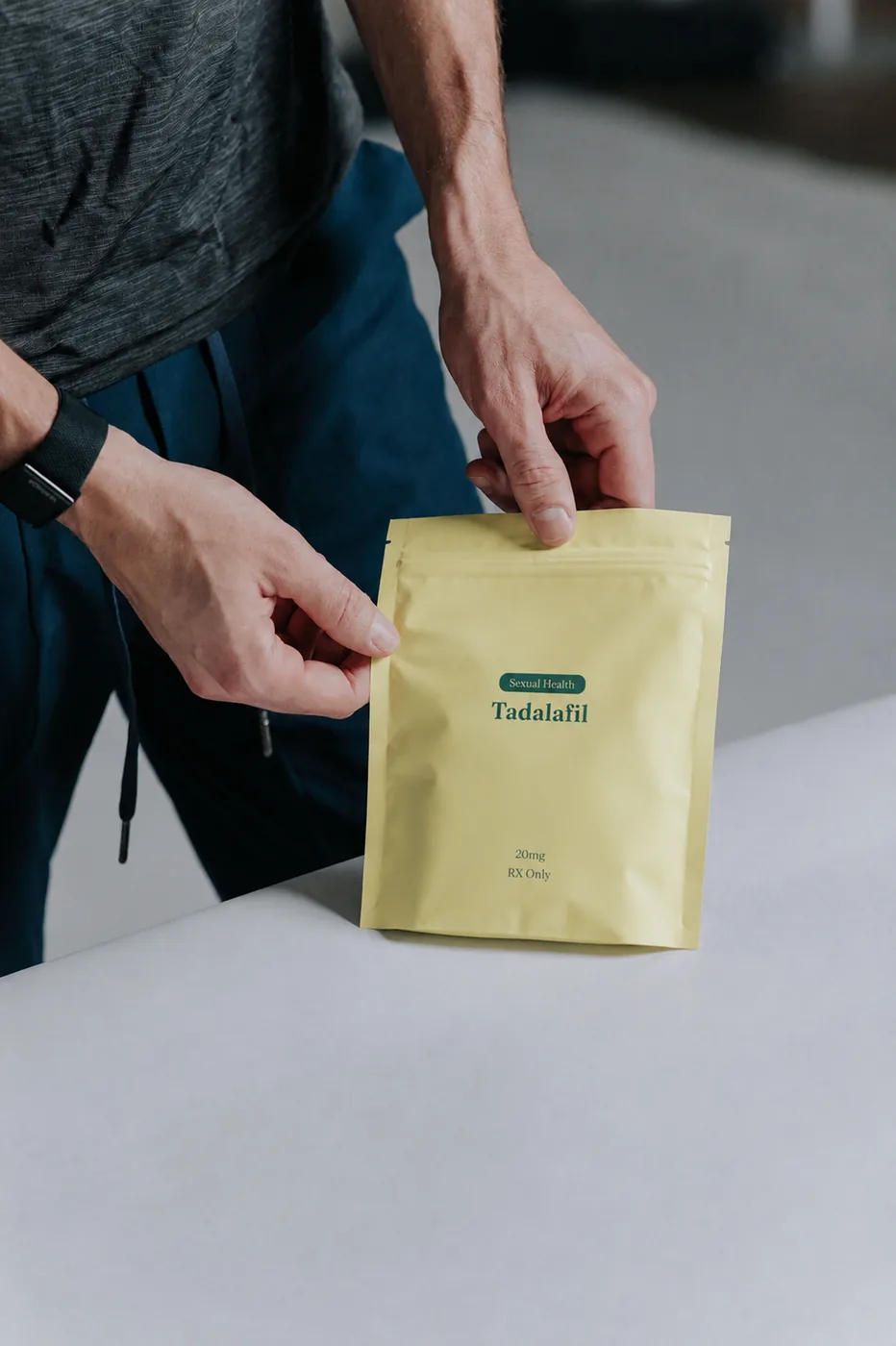 Tadalafil — man holding Helix Seven pouch